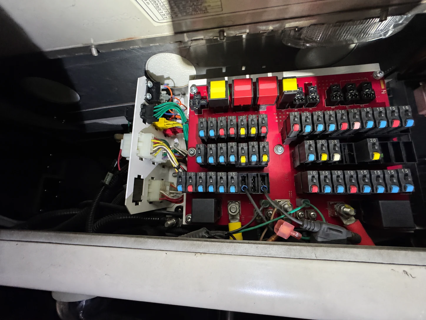Vehicle electrical panel with fuses and connected wiring